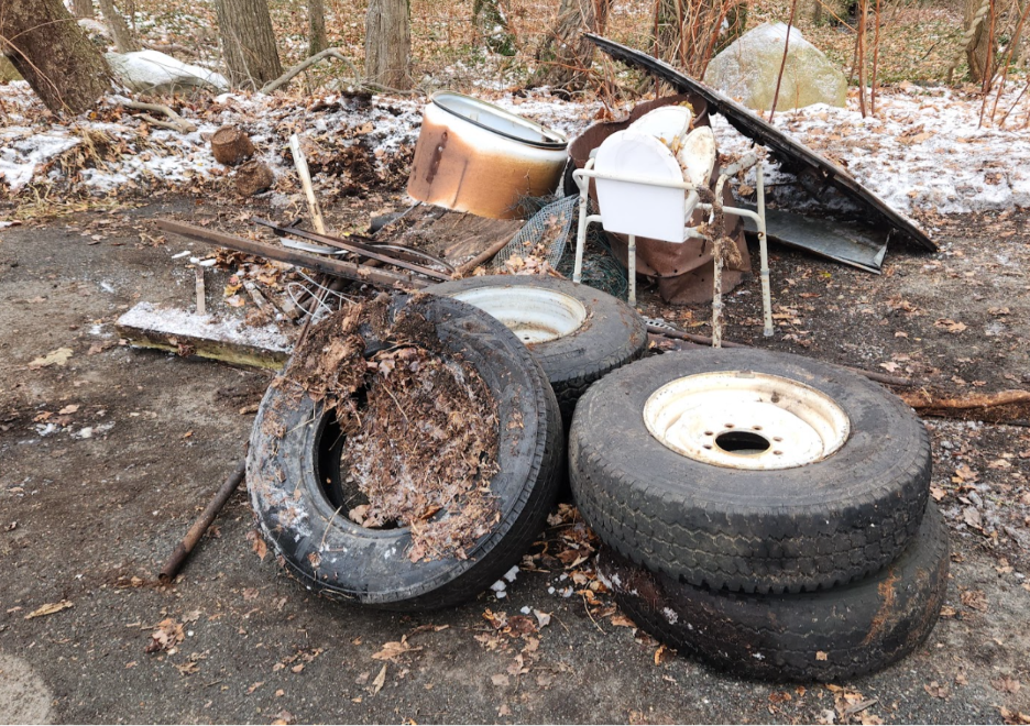A pile of tires and a chair
AI-generated content may be incorrect.